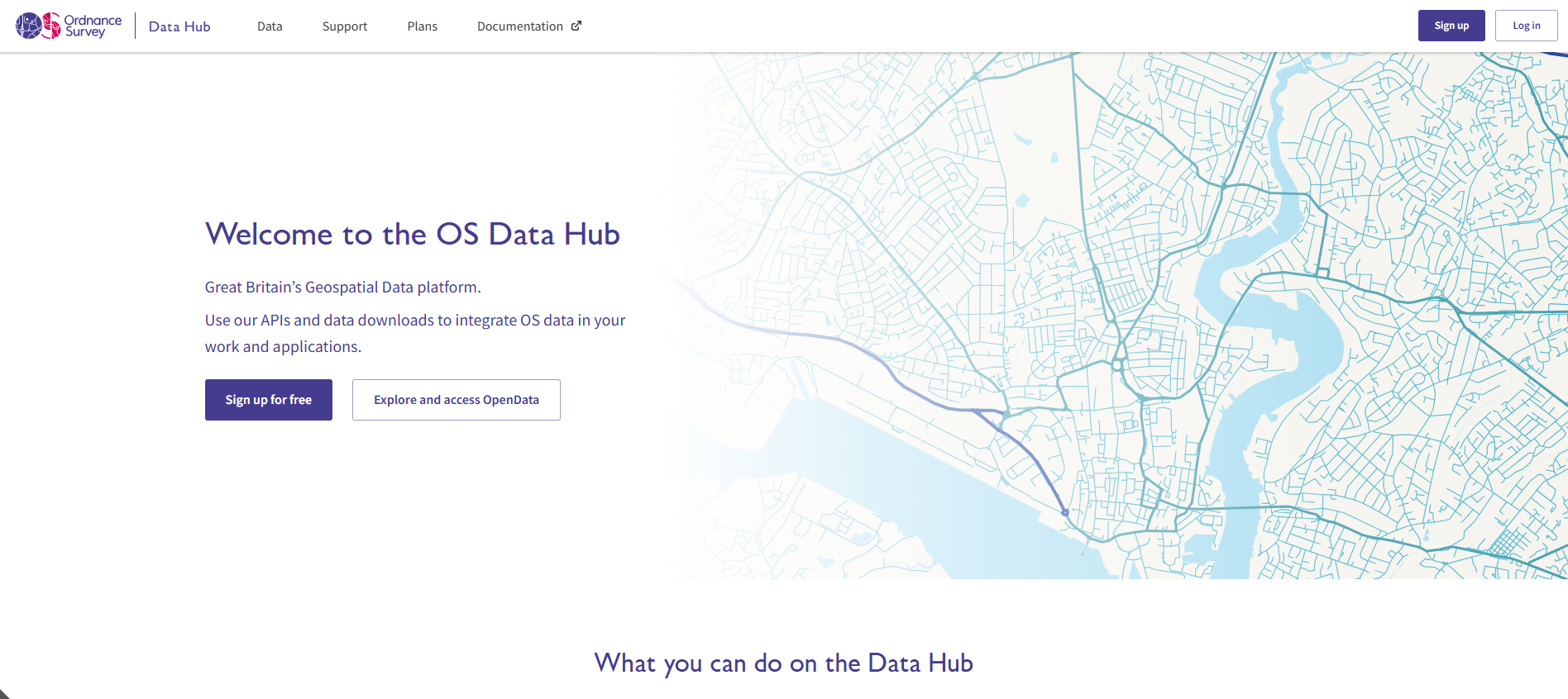 A screenshot of the OS Data Hub home page showing the sign up and log in buttons in the top right hand corner
